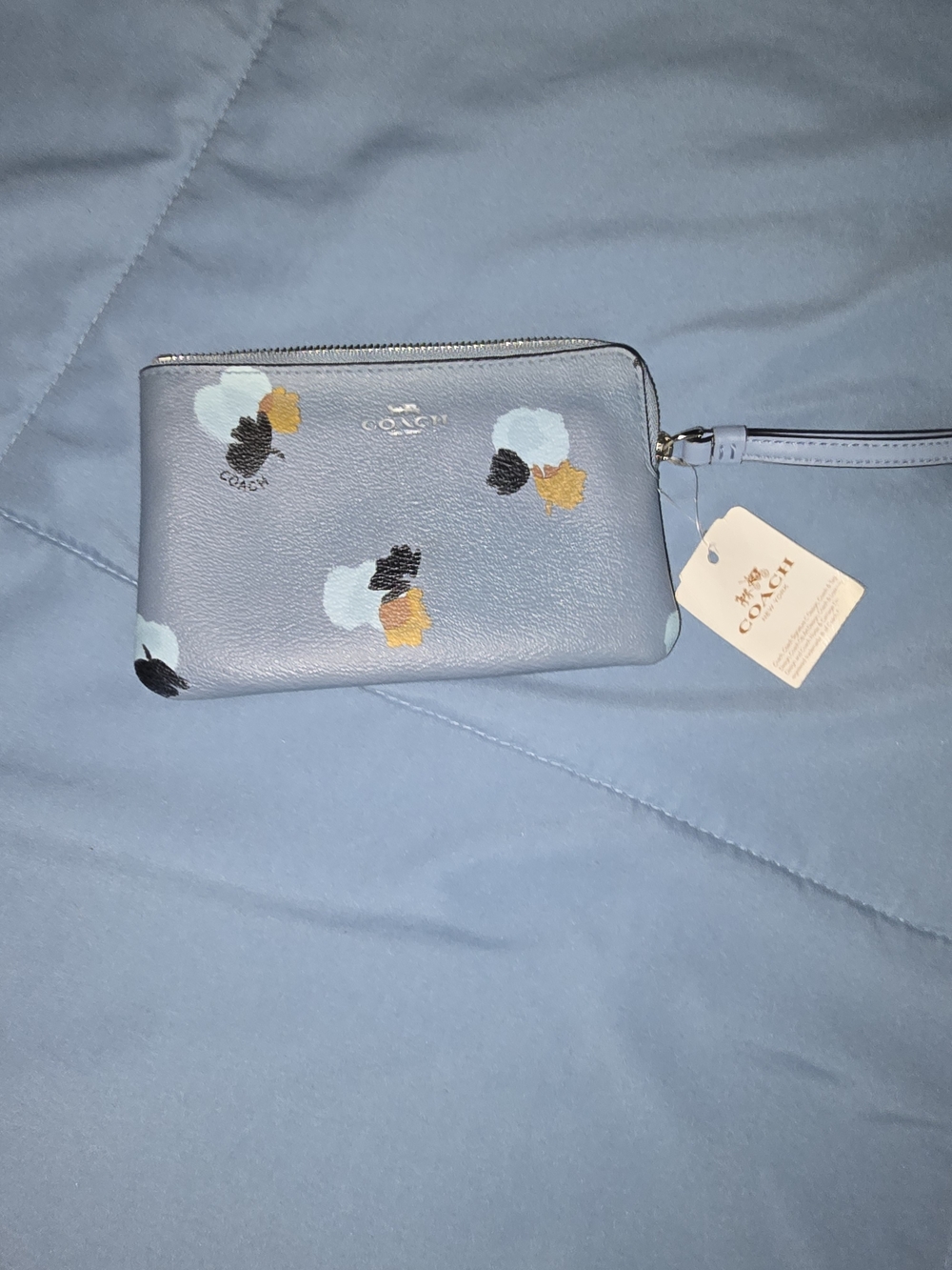 Coach Light Blue Floral Leather Wristlet with Yellow Accents